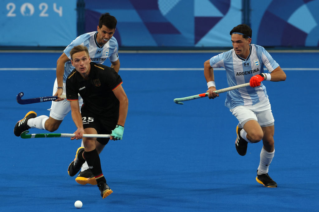 ألمانيا إلي نصف النهائي .. هوكي الرجال 1 f img.kooora.comistoreimageskoooramhmed azizno logogermany argentina hockey2.jpg
