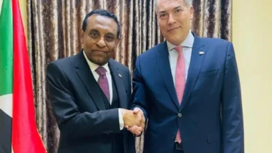 كامل إدريس والمبعوث السويسري.jpg